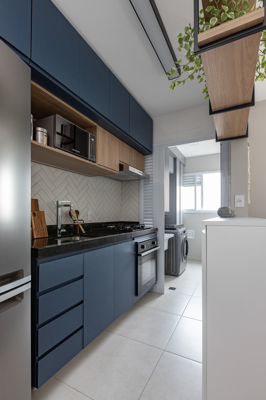 Sem quebra-quebra, apê de 53 m² ganha núcleos e canto alemão com sapateira